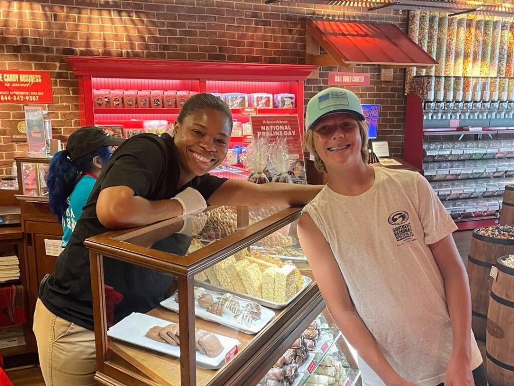 Employee smiling with customer